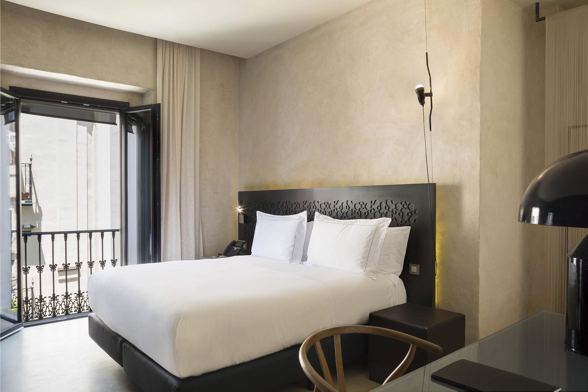 Eme Catedral Mercer Hotel Sevilla Dış mekan fotoğraf A room at the hotel