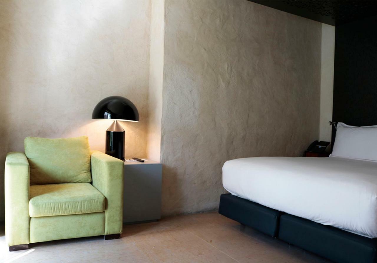 Eme Catedral Mercer Hotel Sevilla Dış mekan fotoğraf A room at the hotel