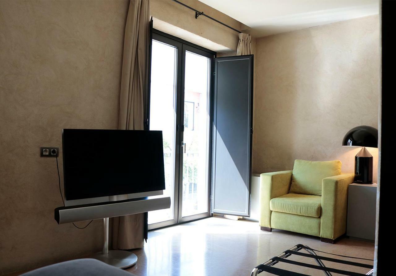 Eme Catedral Mercer Hotel Sevilla Dış mekan fotoğraf A room at the hotel